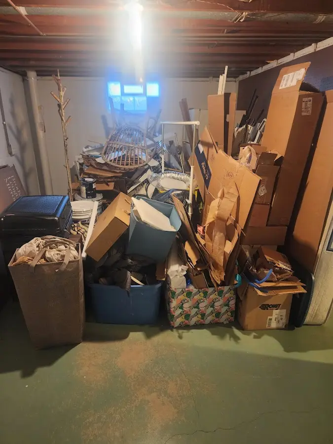 Roll-off dumpster container at job site for Yard Waste Dumpster Rental in Jackson